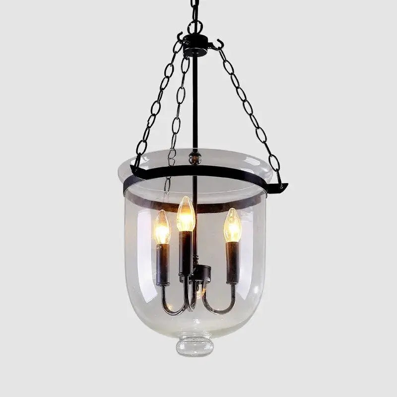 Plafonnier americain avec lampe en verre suspendue, avec armature et chaines noires, en forme de chandelier avec 3 bougies